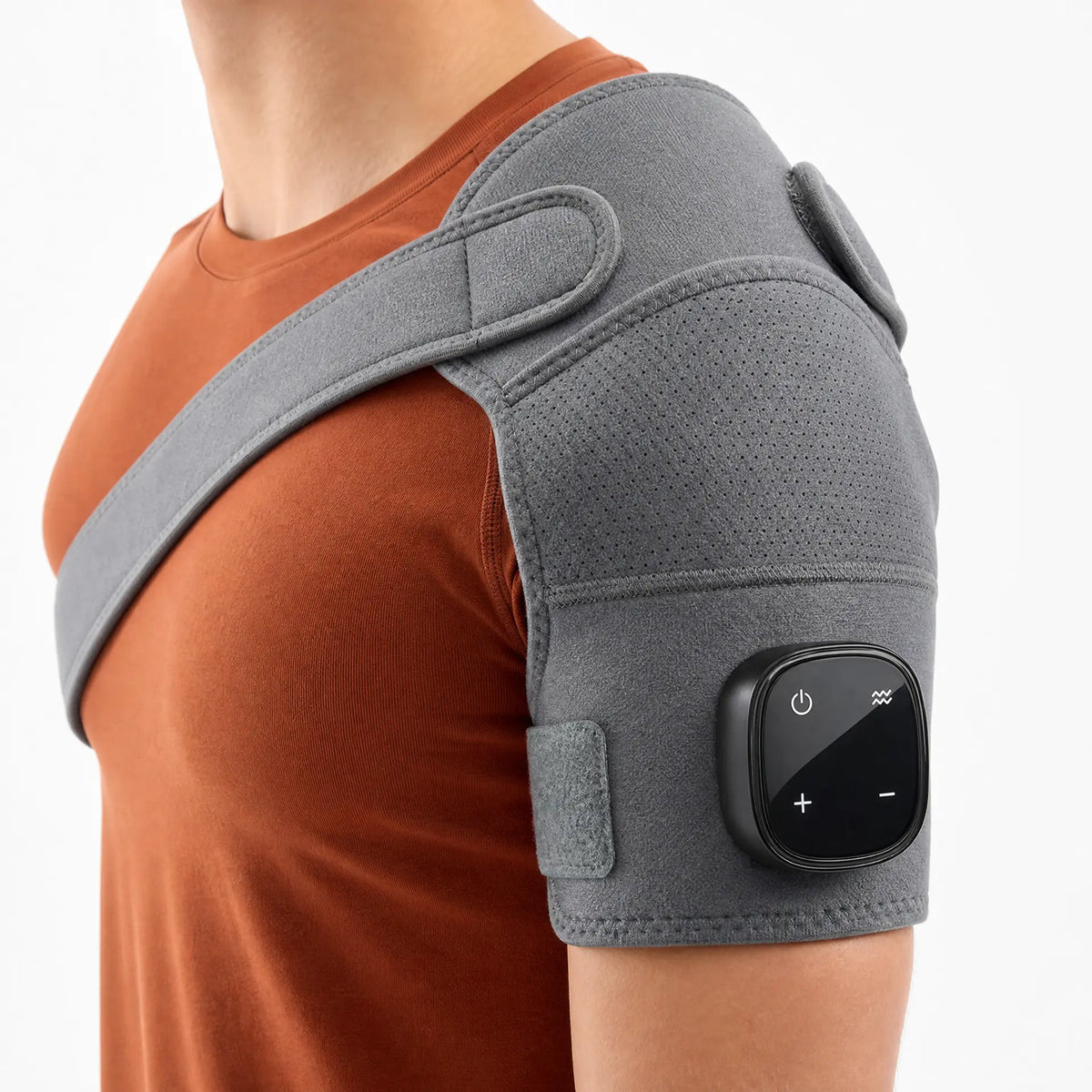 Comfortley gray shoulder massager with heat and vibration worn in a home setting